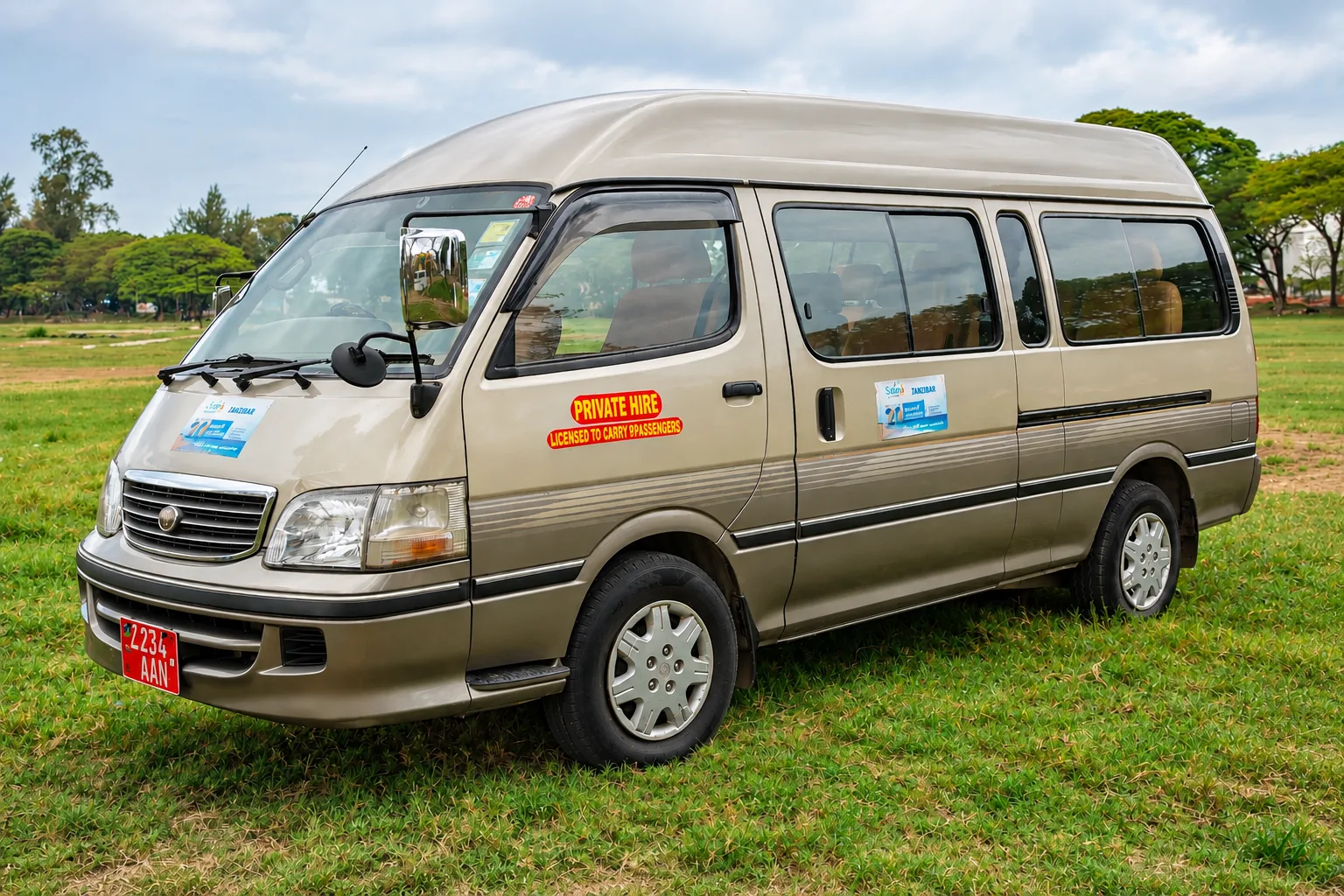Toyota Hiace passenger van parked on the lawn ready for private hire