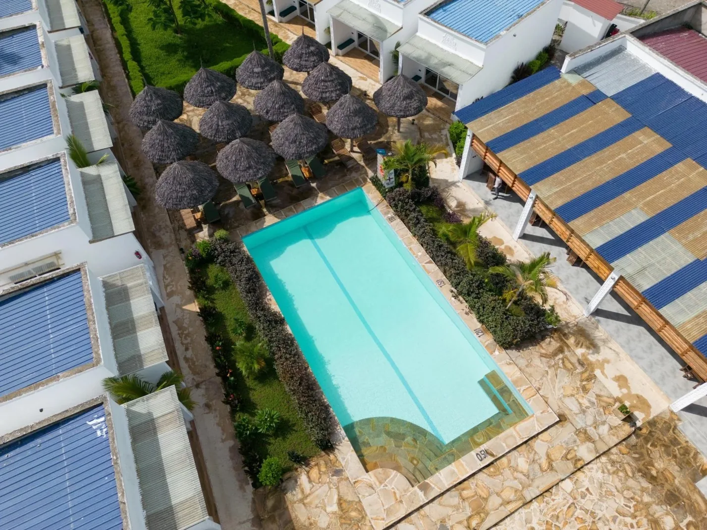 Large outdoor swimming pool at Mafia dream hotel